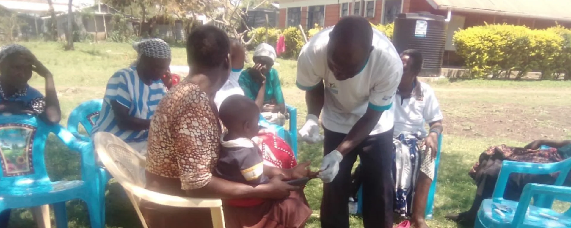 A trained CHV performing Mrdt test to a child at the health facility during a quality assurance activity to ascertain their skills and knowledge on CCMm