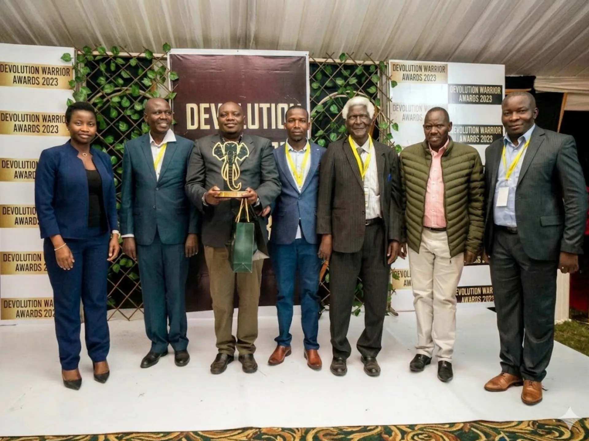 IDF staff receiving the Ndovu Award 2023 for outstanding community governance work in Homa Bay County
